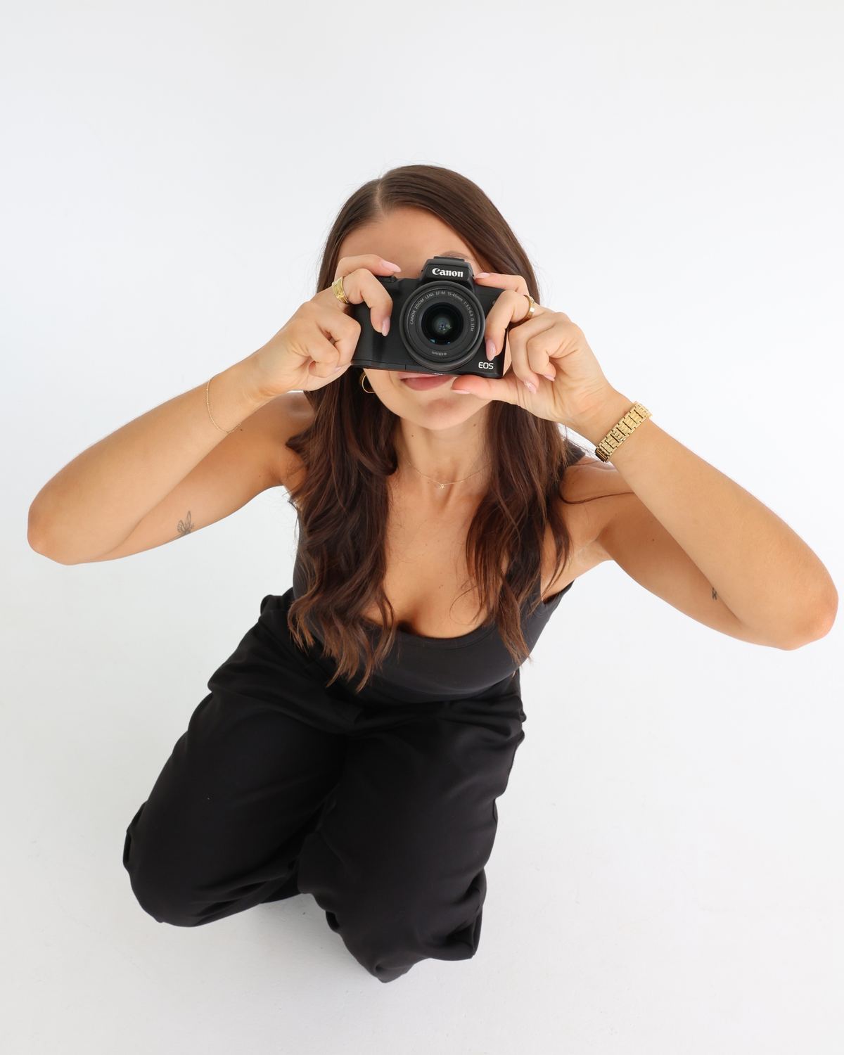 G behind the camera